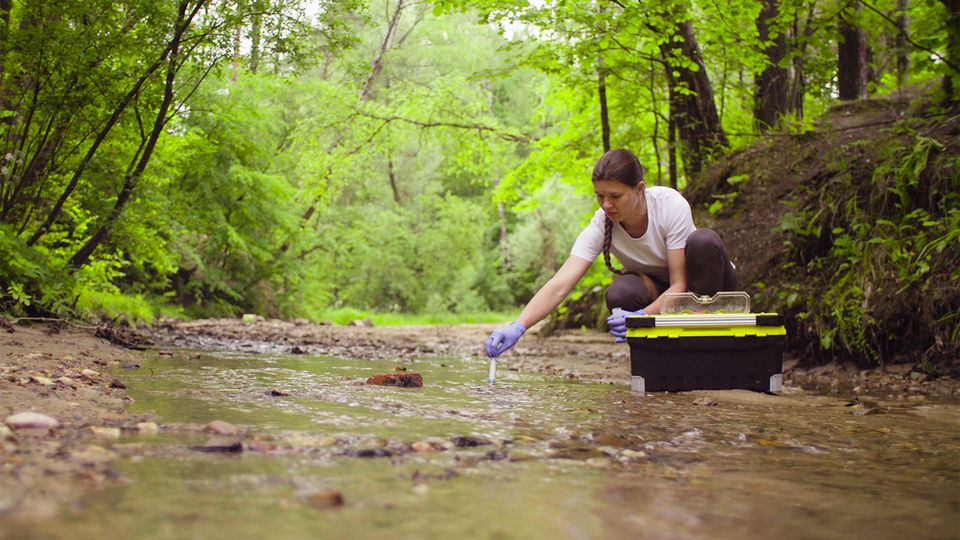 woman at stream